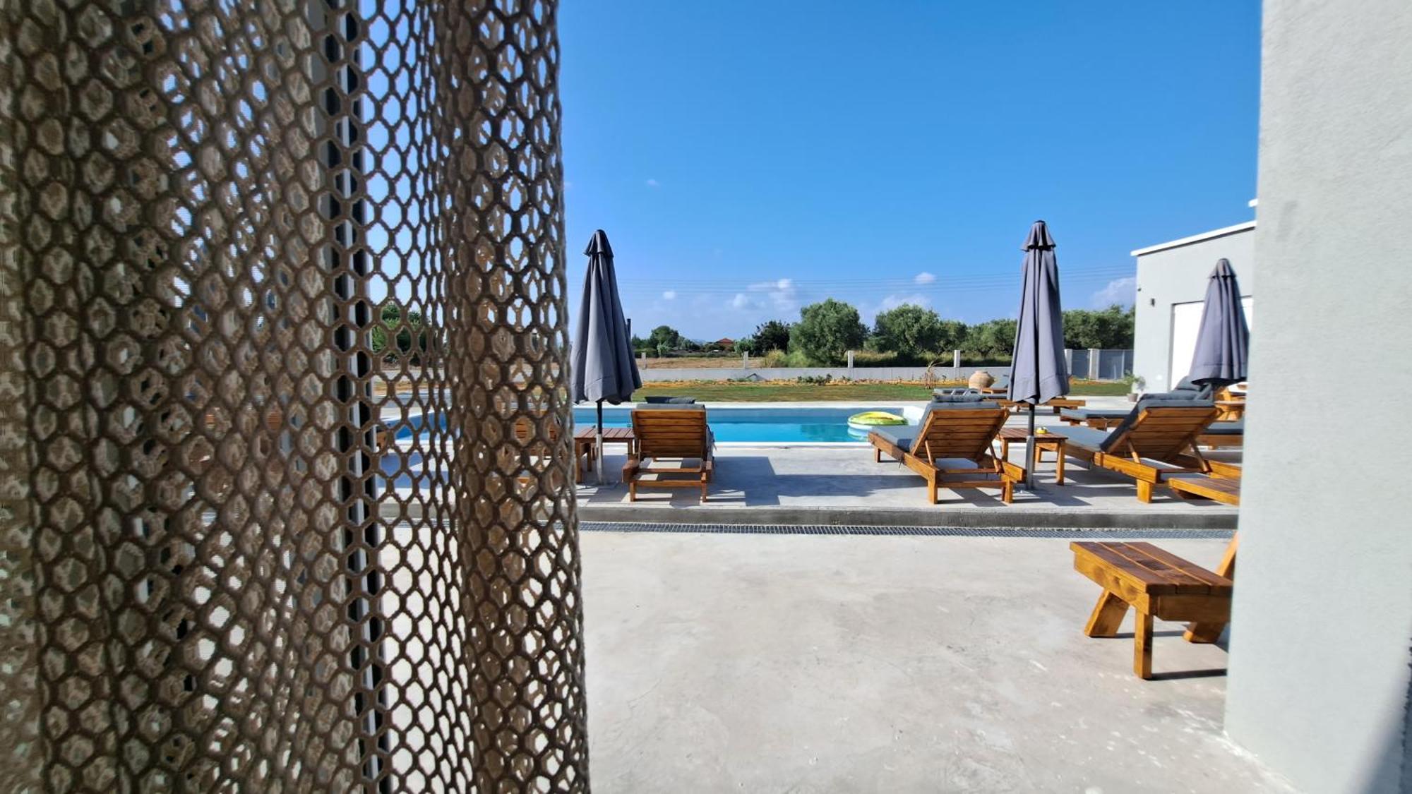 Olympia Suites ปีร์กอส ภายนอก รูปภาพ